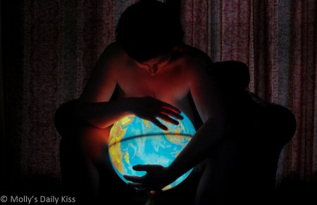 sex blogger holding a globe