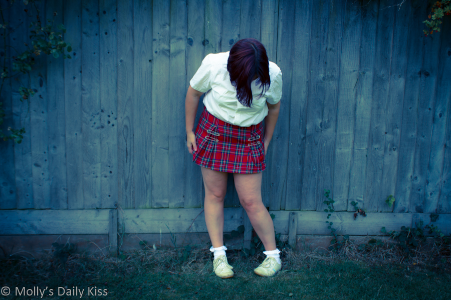 Molly in a schoolgirl uniform